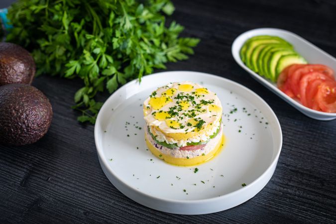 Fresh aromatic Lima cause of tuna with sliced vegetables