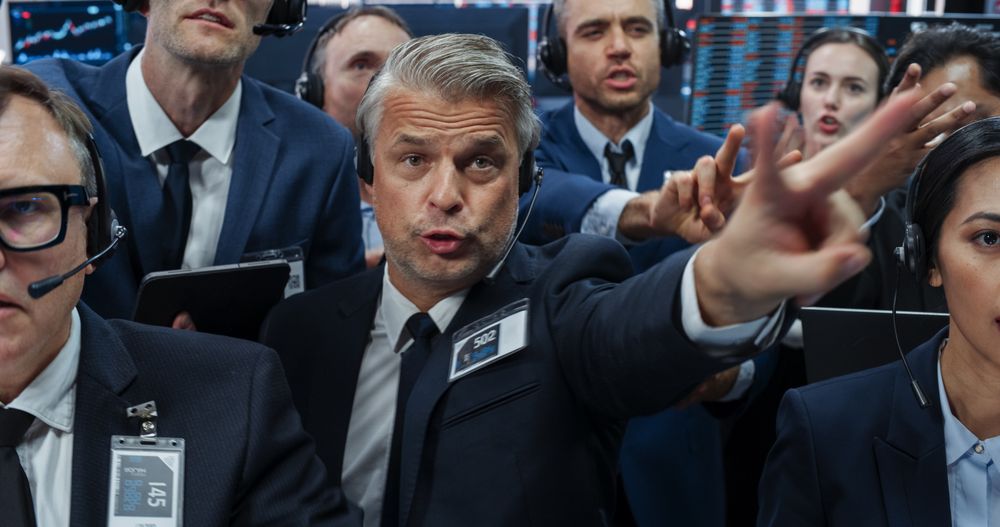 Portrait of Professional Traders Working on Stock Exchange. Enthusiastic Men and Women Shouting, Signaling Orders for Company Shares and Commodities to Brokers at an Open Outcry Arbitrage