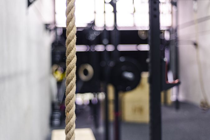 Rope hanging near wall in gym
