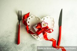 Valentine's Day red themed dinner setting with heart shaped plate bGRRPx