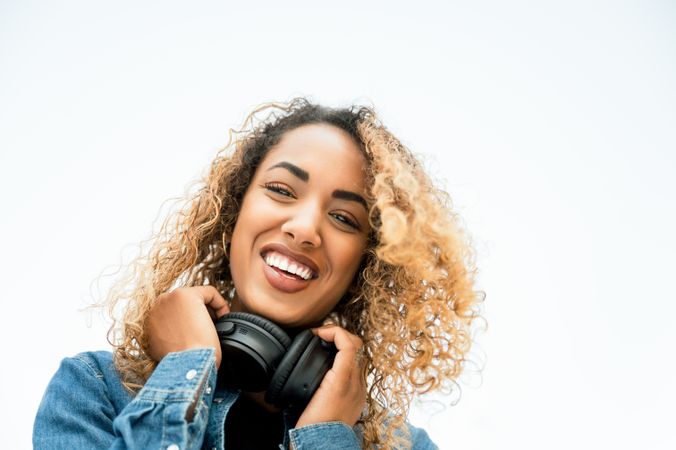 Smiling woman with camera