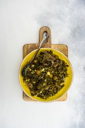 Delicious Chakapuli is a Georgian stew on yellow plate