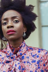 Portrait of woman in pink and blue floral button up shirt