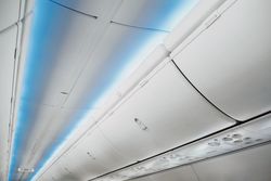 aircraft ceiling compartment with different buttons