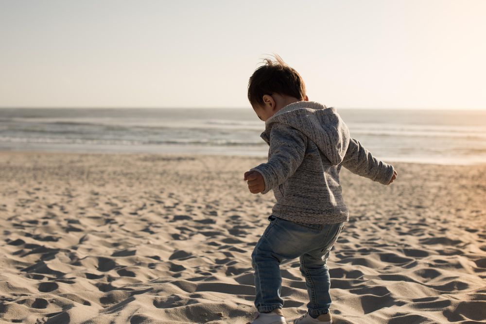 Boy playing on beach