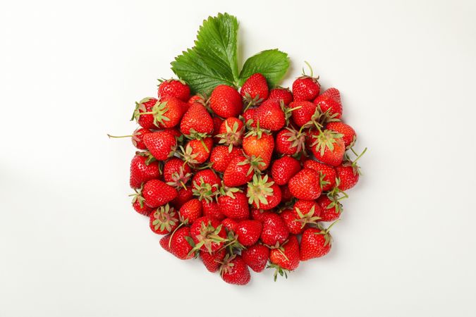 Tasty red strawberry on plain background, top view. Summer berry