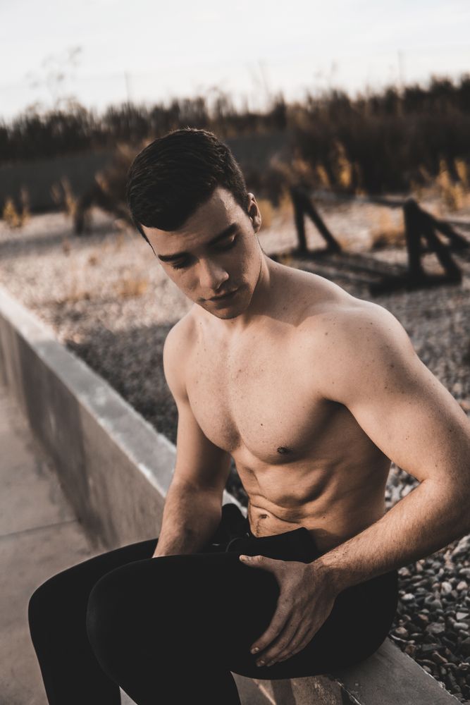 Strong male near concrete wall
