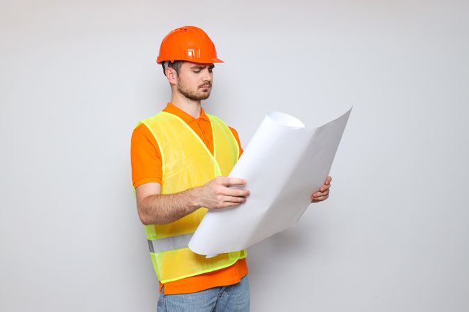 Young man civil engineer in safety hat