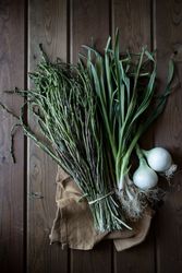 Fresh green asparagus with onion bulbs
