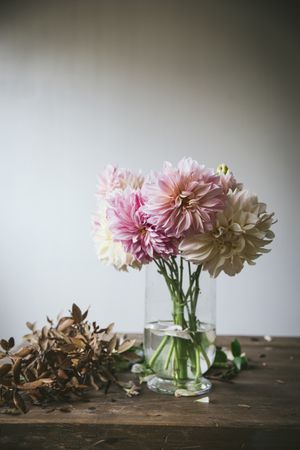 Bunch of flowers in vase on table