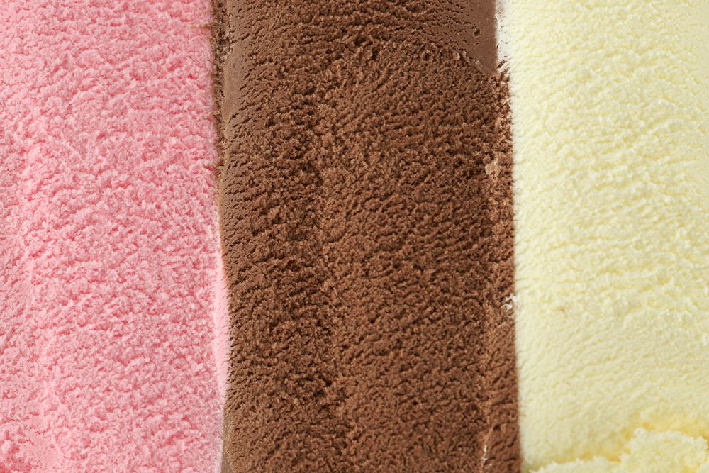 Texture of Pink, Vanilla, and Chocolate Ice Cream Like Background