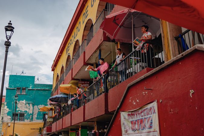 People standing on the balcony in Mexico