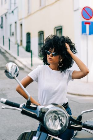 Stylish female on motorbike