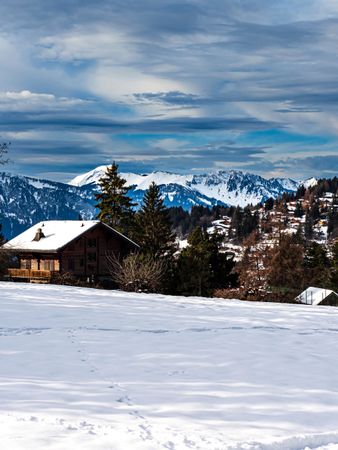 Swiss Alps winter landscape with snow and sun, mountains in Europe