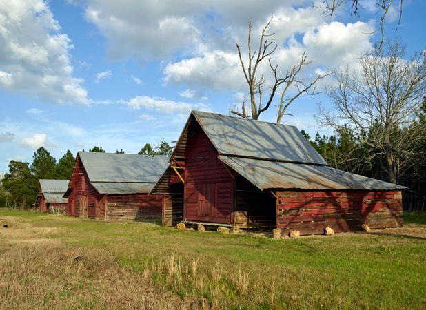Three rustic old barns in Georgia countryside