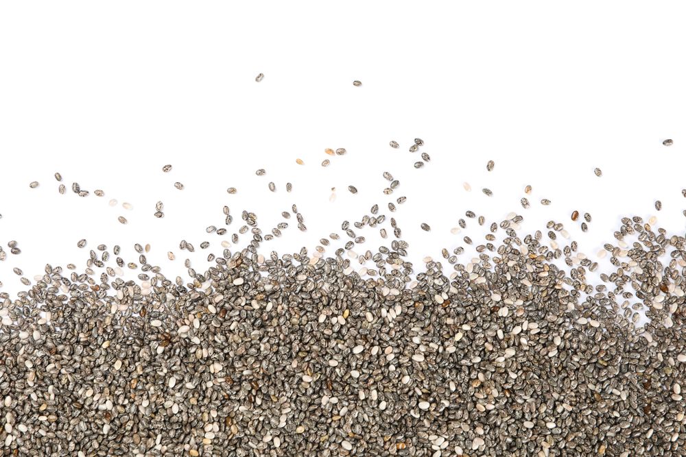 Many chia seeds isolated on plain background
