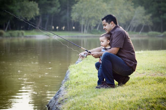 Happy Father and Son Fishing