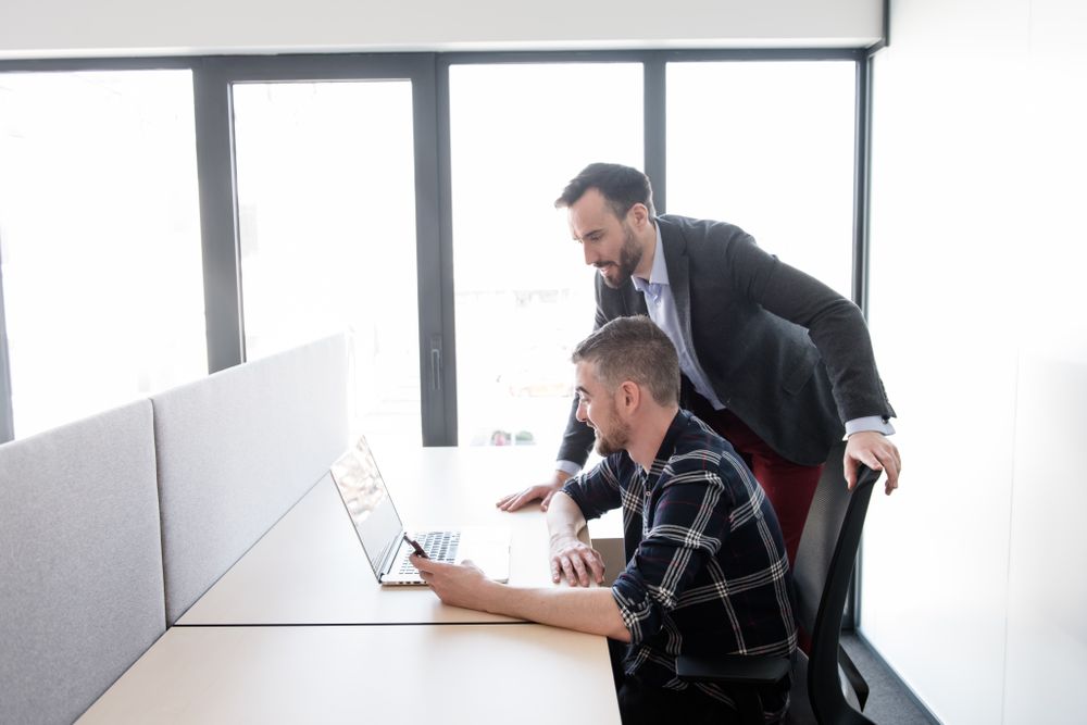 Group of colleagues working in contemporary office