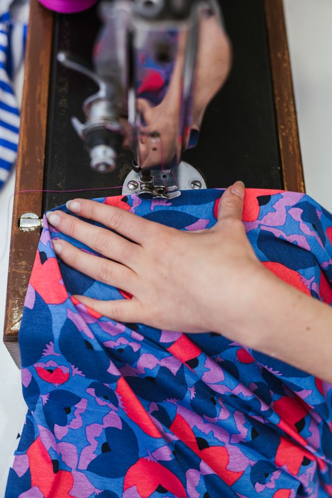 Woman in a sewing school