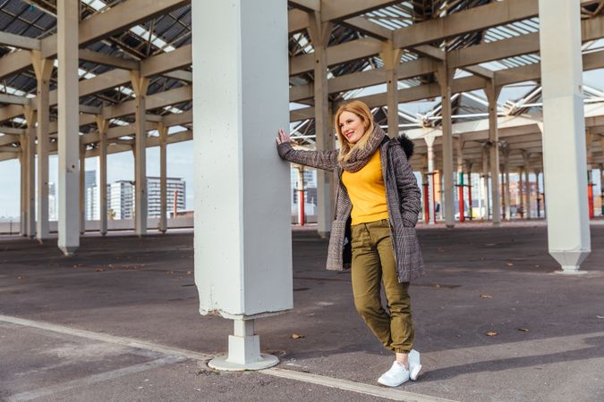 Portrait of blonde woman posing in the city