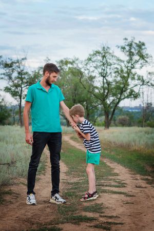 Affectionate father with son outdoor