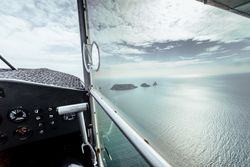 Flight over islands in the middle of the sea