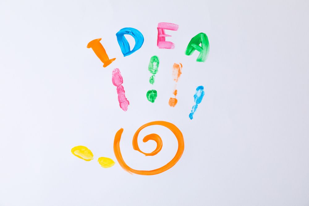 Color child palm and inscription Idea on blank background, space for text