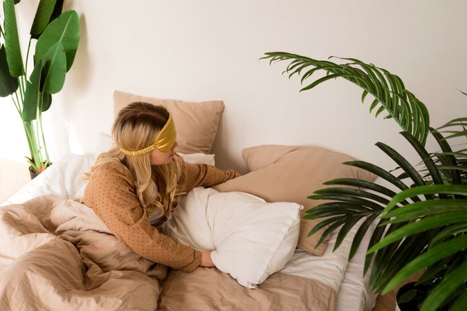 The woman goes to bed