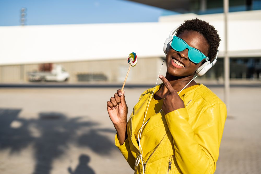 Black woman eating candy