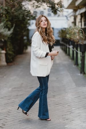 Charming woman posing on street