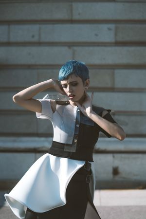 Expressive model in alternative dress on street