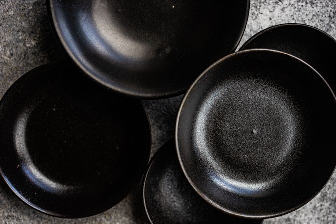 Round geometric stacked dark bowls