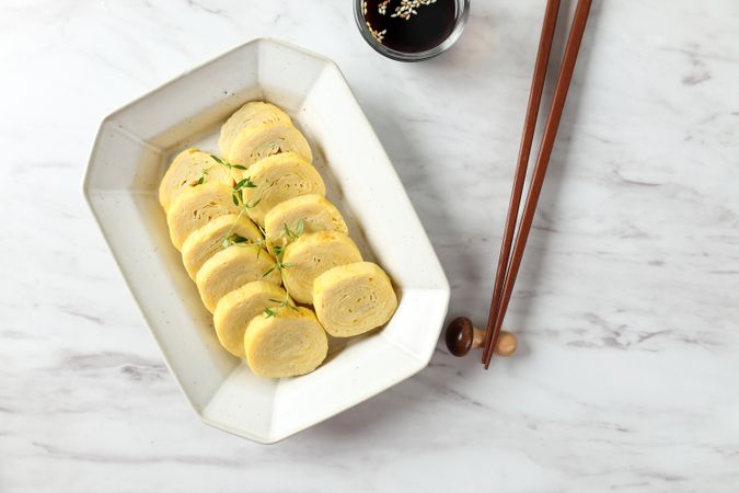 Tamagoyaki, Japanese Rolled Egg Omelette Served with Soy Sauce