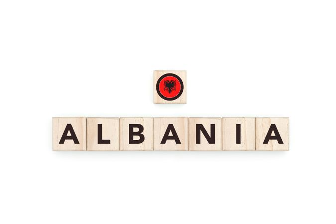 Wooden blocks bearing the name and flag of Albania.