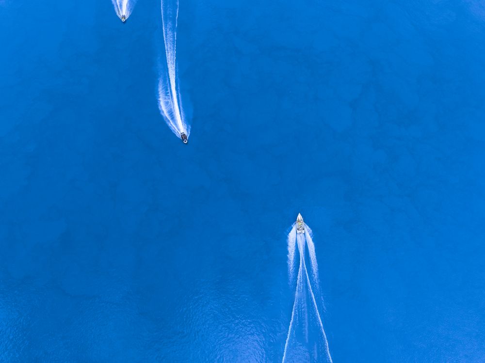 A motorboat traveling across the water.