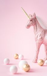 Pink glitter unicorn with gold and shiny decorations