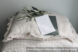 Fluffy beige linen, cotton gingham pillows with greeting card mockup 5rpdpb