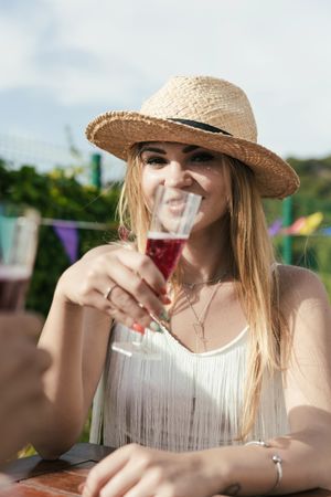 Group of friends drinking sangria on the terrace