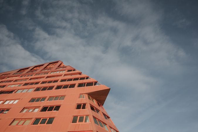 Modern abstract building and cloudy sky