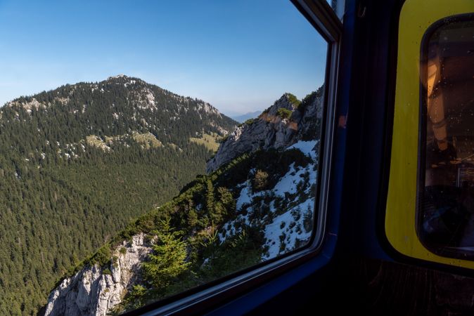 Cog railway window view in the Bavarian Alps on a sunny day in September