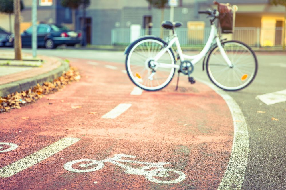 Bike parked across bike lane