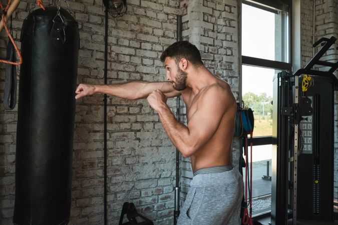 Man boxing in gym