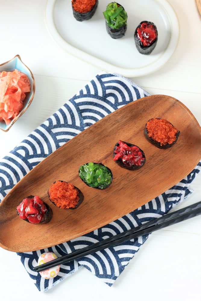 Gunkan Sushi on Oval Wooden Plate