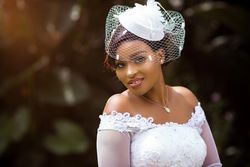 Portrait of young bride posing outdoor