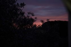 Early morning behind the mountain, dark landscape, sunrise sky