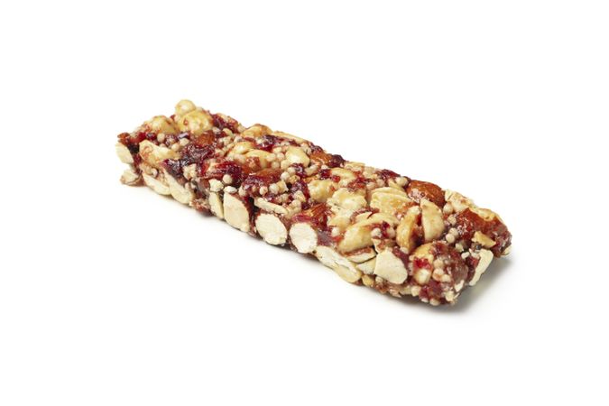 Tasty granola bar isolated on blank background