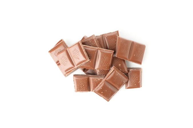 Tasty chocolate pieces isolated on plain background