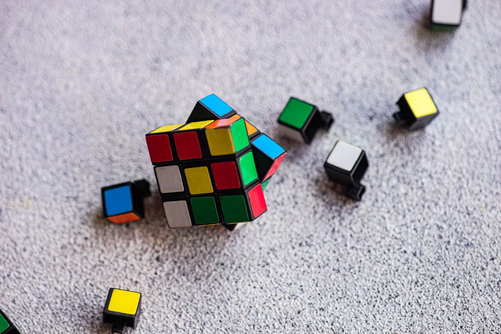 Rubik's cube details on the concrete background