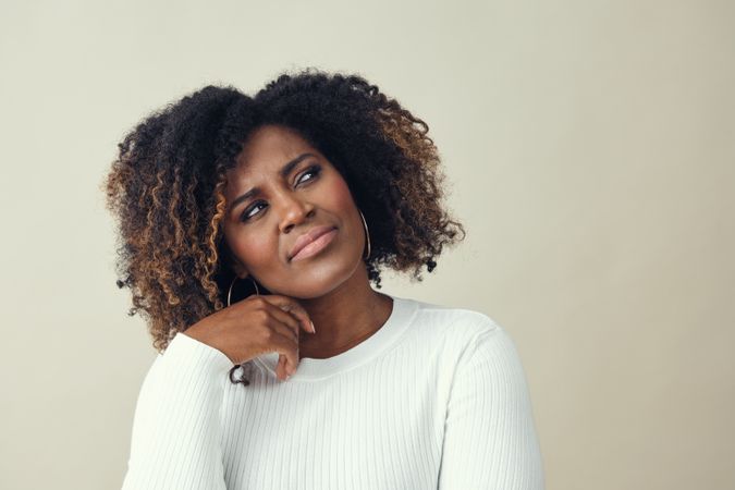 Portrait of Black woman contemplating a problem