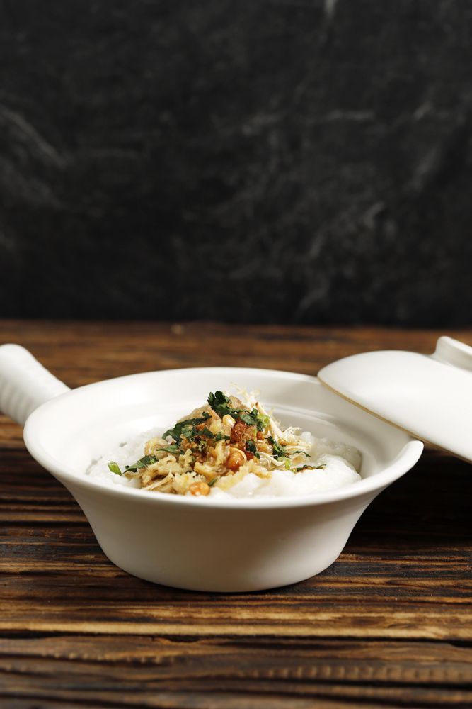 Rice porridge on wooden table